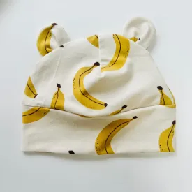 Eddie & Bee organic cotton Baby hat with ears  in Cream "Banana” print.